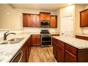 Spacious kitchen with granite countertops, stainless steel appliances, and ample cabinet space at 610 Sunflower Dr, Canton, GA 30114