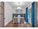 Bright office space featuring hardwood floors, wainscoting, and elegant french doors at 135 Old Alabama Rd, Emerson, GA 30137