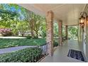 Relaxing covered porch offering scenic views of lush greenery at 3544 Chestatee Dr, Marietta, GA 30062