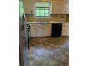 Functional kitchen space with essential appliances and ample counter space at 2685 Hyde Cir, Duluth, GA 30096