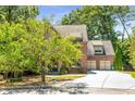 Beautiful two-story brick home with mature trees and landscaping in a desirable neighborhood at 504 S Westminster Ne Way, Atlanta, GA 30307
