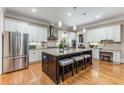Open concept kitchen with a large island, stainless steel appliances, and ample cabinet space at 504 S Westminster Ne Way, Atlanta, GA 30307