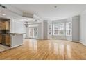 Spacious living room with hardwood floors, bay windows, and open design offers abundant natural light at 850 Piedmont Ne Ave # 3304, Atlanta, GA 30308