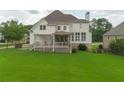 Spacious backyard featuring a large deck, perfect for outdoor entertaining at 388 Golf Crest Dr, Acworth, GA 30101