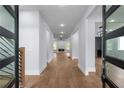Inviting foyer with hardwood floors leading to a modern living space at 1604 Niskey Lake Rd, Atlanta, GA 30331
