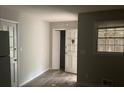 A living room features sleek gray floors, with lots of space ready for your personal touches and customization at 971 Canyon Sw Trl, Marietta, GA 30060
