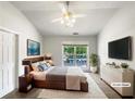 Serene bedroom featuring a ceiling fan, natural light, and closet space at 2031 Austin Park Cir, Decatur, GA 30032
