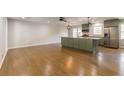 Spacious kitchen with a large center island, stainless steel appliances, and hardwood floors at 2146 Chevy Chase Ln, Decatur, GA 30032