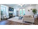 Bright living room with fireplace, french doors, and open layout at 3518 Mount Blue Ave, Tucker, GA 30084