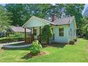 Beautiful home exterior with a well-maintained lawn and tasteful landscaping at 5 Windsor Ter, Avondale Estates, GA 30002