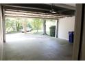 Spacious two-car garage with automatic door and room for storage and access to the backyard at 1245 Mclendon Dr, Decatur, GA 30033
