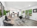 Open floor plan with a modern living space with a dining area and a kitchen at 2160 Perkerson Sw Rd, Atlanta, GA 30315