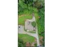 Aerial view of property showcasing the home's placement on a wooded lot at 2742 Alpine Rd, Atlanta, GA 30305