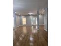 Spacious living room with light gray walls, hardwood flooring, and recessed lighting at 3189 Jackson, Hapeville, GA 30354
