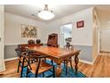 Comfortable dining room features wood floors and large table, perfect for Gathering dinners and gatherings at 1750 Clairmont Rd # 35, Decatur, GA 30033