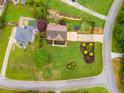 Expansive backyard with pool, mature trees, and patio area at 638 Oberlochen Way, Douglasville, GA 30134