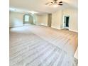 Expansive bonus room featuring neutral carpeting and ample natural light at 759 Hennepin Ter, Mcdonough, GA 30253