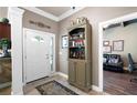 Open foyer with a view of the living area and beautiful tile flooring at 530 Mount Park Dr, Powder Springs, GA 30127