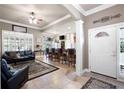 Spacious living room with bar seating, natural light, and an open floor plan at 530 Mount Park Dr, Powder Springs, GA 30127