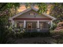 Charming home exterior featuring a covered front porch at 1405 May Se Ave, Atlanta, GA 30316