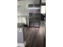 This kitchen boasts stainless steel appliances, white cabinets and granite countertops at 836 Wood Nw St, Atlanta, GA 30318