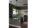 Stylish kitchen with white cabinets, stainless steel appliances and granite countertops at 836 Wood Nw St, Atlanta, GA 30318