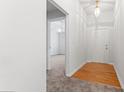 Bright entryway featuring hardwood floors and a view into the living room at 10231 Deep Creek Pl, Union City, GA 30291