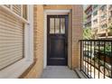 Apartment number 5, black front door with yellow brick and black railings at 653 N Highland Ne Ave # 5, Atlanta, GA 30306