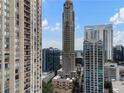 Stunning city view featuring modern high-rise buildings against a clear blue sky at 3376 Peachtree Rd # 1, Atlanta, GA 30326