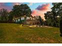 Exterior backyard featuring a deck, patio and fire pit, perfect for outdoor entertaining at 429 Oakland Ave, Atlanta, GA 30312