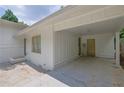Covered carport featuring an electric vehicle charger and ample space for parking at 1585 Melanie Ct, Decatur, GA 30032