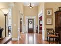 Elegant foyer with high ceilings, hardwood floors, and natural light at 4115 Gold Mill Rdg, Canton, GA 30114