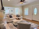 Bright and airy living room with hardwood floors, fireplace, and stylish furnishings at 2437 N Decatur Rd, Decatur, GA 30033