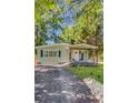 Inviting home features charming curb appeal, lush lawn, and a welcoming front entrance at 2572 Bates Se St, Smyrna, GA 30080