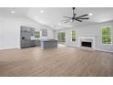 Open-concept floor plan with a modern kitchen, fireplace, and ample natural light, perfect for comfortable living at 3156 Ozmer Lndg, Decatur, GA 30034