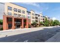 Apartment building exterior with brick facade, multiple balconies, and street view at 400 17Th Nw St # 1321, Atlanta, GA 30363