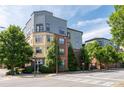 Multi-story building exterior showcasing a modern architectural design with a mix of colors and materials at 400 17Th Nw St # 1321, Atlanta, GA 30363