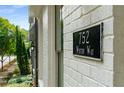 Close-up of the home's address sign on the exterior wall at 752 Winton Way, Atlanta, GA 30312