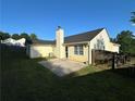 Spacious backyard features a concrete patio, fenced yard and plenty of room for outdoor activities at 929 Wexford Way, Auburn, GA 30011