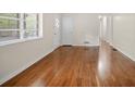 Spacious living room showcasing pristine hardwood floors and ample light at 4400 Hickory Wood Ln, Atlanta, GA 30360
