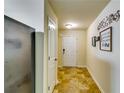 Inviting foyer with tile flooring and bright lighting at 1155 Magnolia Gardens Walk, Mcdonough, GA 30253