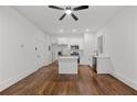 Bright, remodeled kitchen with stainless appliances, white cabinetry and butcher block island at 360 Ponce De Leon Ave Ne # 1, Atlanta, GA 30305
