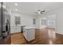 Bright, remodeled kitchen with stainless appliances, white cabinetry and butcher block island at 360 Ponce De Leon Ave Ne # 1, Atlanta, GA 30305