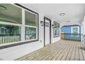 Inviting covered front porch features classic columns and a stylish entrance door at 1090 Mcdaniel St, Atlanta, GA 30310