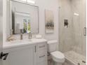 Modern bathroom with a glass-enclosed shower, stylish vanity, and contemporary fixtures at 1237 Memorial Se Dr # 404, Atlanta, GA 30316