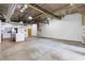 Spacious kitchen features white cabinets, an island and stainless steel appliances at 505 Whitehall Sw St # 102, Atlanta, GA 30303