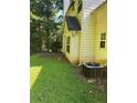 The house's rear exterior shows the siding with a well-manicured yard at 2581 Star Ln, Decatur, GA 30034
