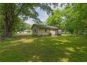 Large, grassy backyard that offers plenty of space for outdoor activities and gardening at 525 Baker Nw Cir, Atlanta, GA 30318