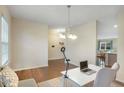 Cozy office space with a desk, chair, hardwood floors, and ample natural light at 105 Paulowina Cir, Mcdonough, GA 30253