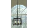 Close up of chandelier near a window at 7097 Cavender Sw Dr, Atlanta, GA 30331